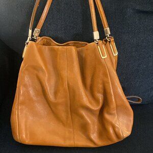 Tan leather Coach purse